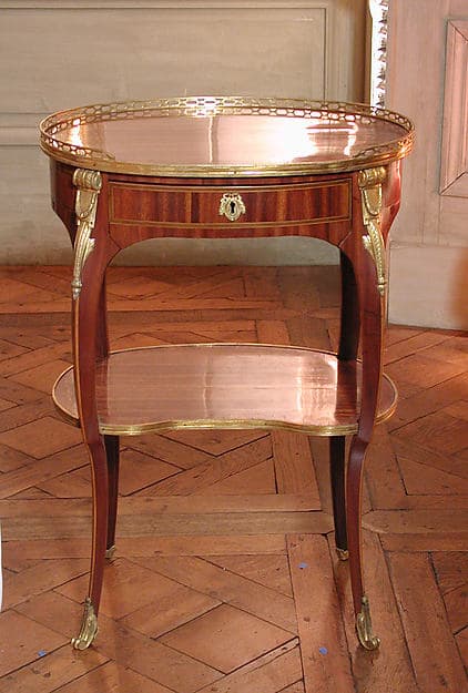 Small oval writing table (one of a pair), by Roger Vandercruse, called Lacroix
