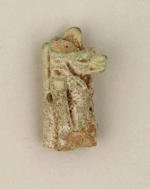 Faience amulet of a canine-headed Anubis
