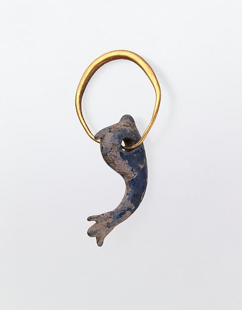 Gold earring with glass pendant in the form of a dolphin