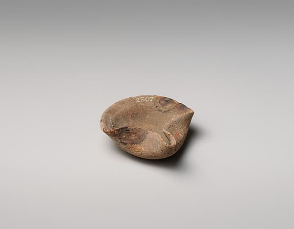 Terracotta saucer-shaped lamp