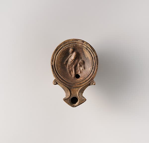 Terracotta oil lamp