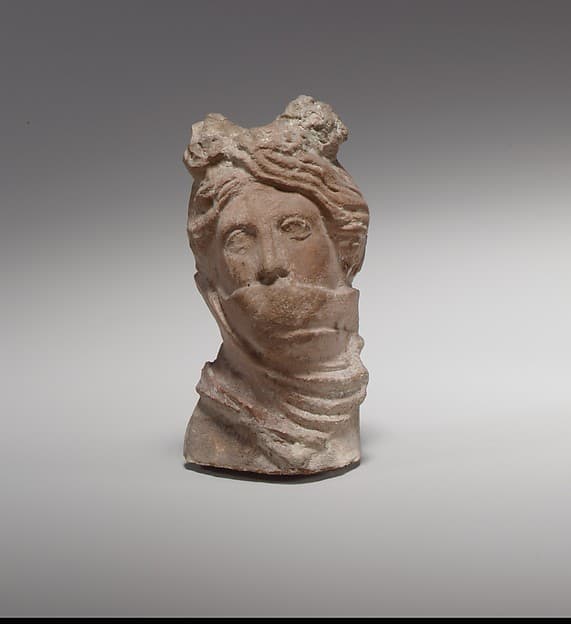 Terracotta head of a veiled woman