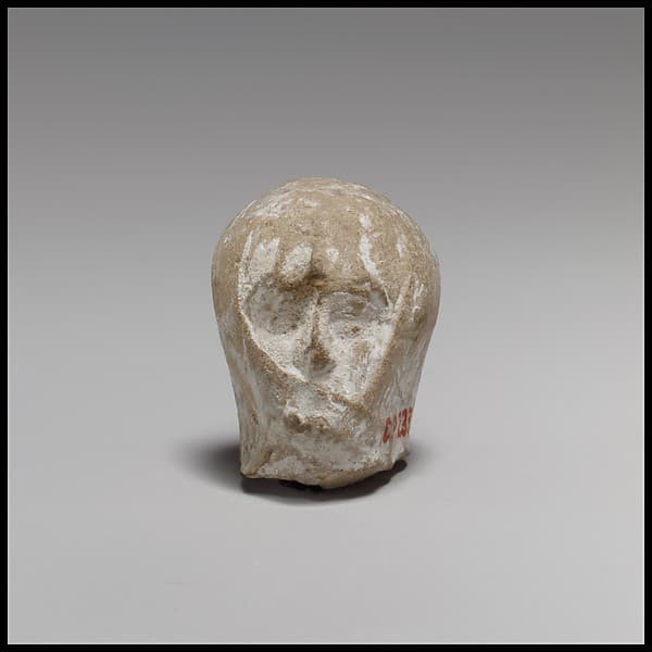 Terracotta head of a veiled woman