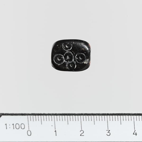 Serpentine triangular prism with circles