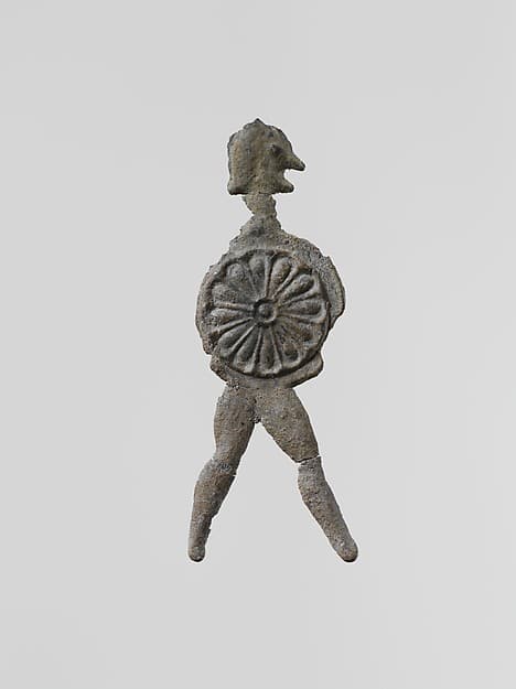 Lead figure of a warrior with a helmet and shield
