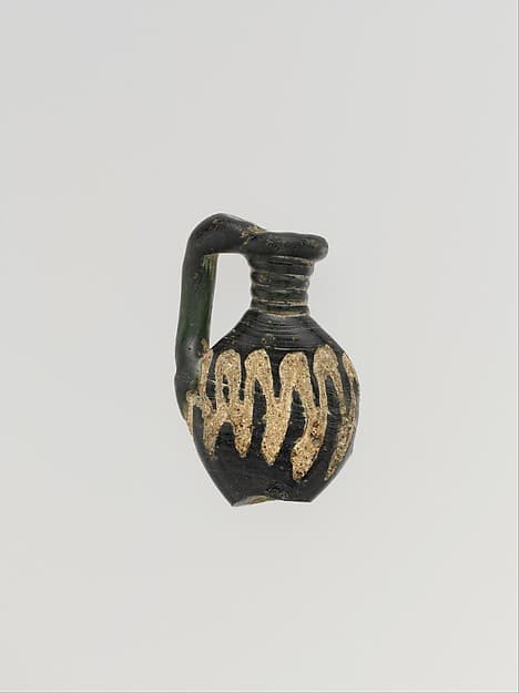 Glass pendant shaped like a jug