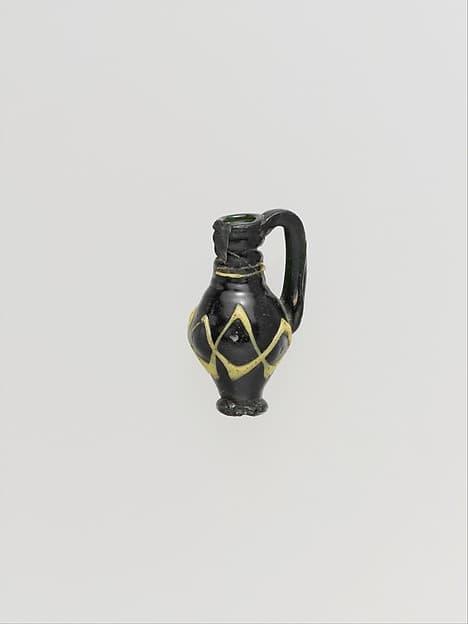 Glass pendant in the form of a miniature jug