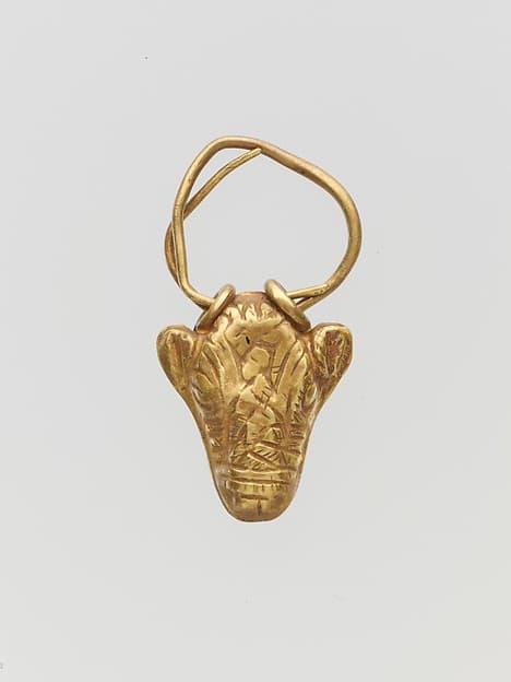 Gold pendant in the form of a bull's head