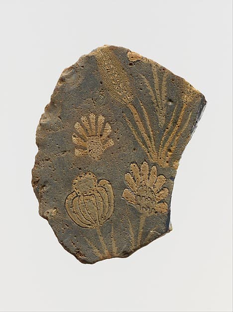Glass mosaic plaque fragment with floral motifs