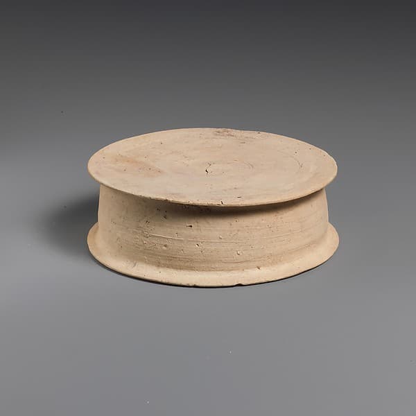 Terracotta statuette base