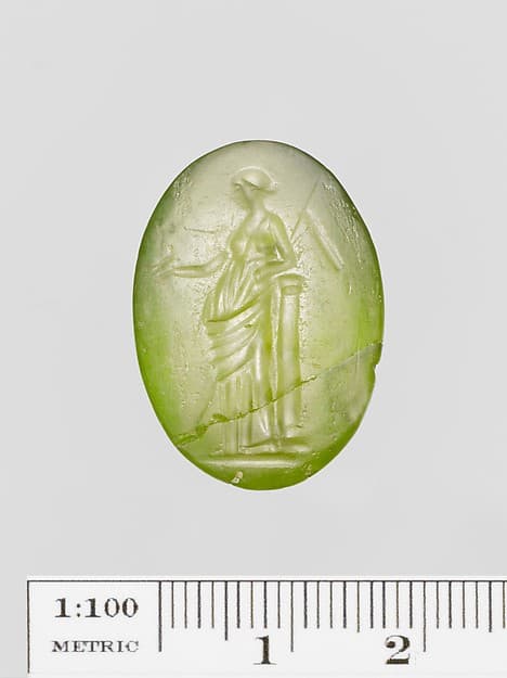 Green glass oval engraved on both sides