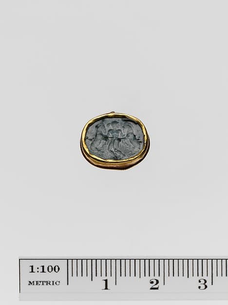 Plasma scaraboid seal set in a gold band