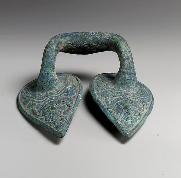 Bronze handle of a vessel with Silenos mask