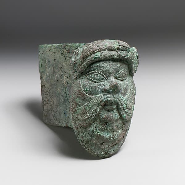 Fragment of a cart or chariot, socket with satyr mask