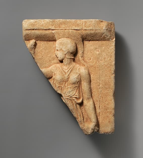 Marble fragment of a votive relief with Athena