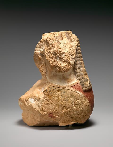 Fragmentary limestone sphinx