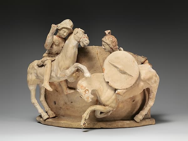 Terracotta relief probably from a funnel vase
