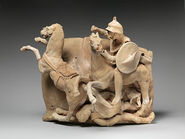Terracotta relief probably from a funnel vase