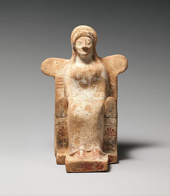 Terracotta statuette of a seated woman