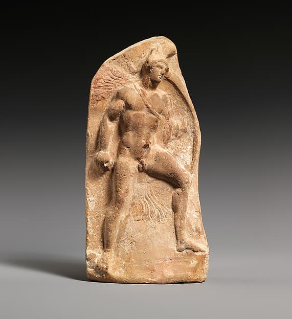 Terracotta relief depicting a warrior