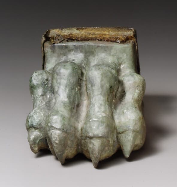 Bronze lion paw