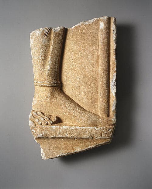 Fragmentary marble grave stele of a hoplite (foot soldier), by Aristokles