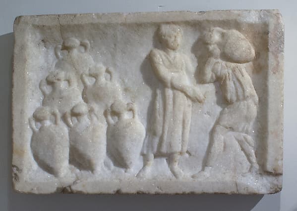 Marble relief showing transport amphorae