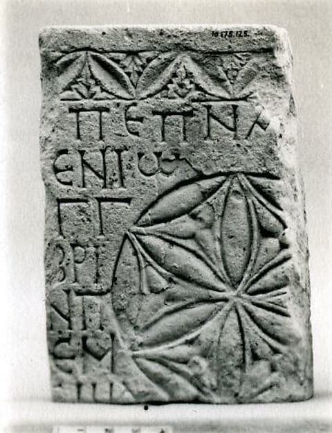 Fragment of an Inscribed Slab with a Rosette