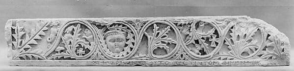 Frieze with Acanthus Vines, Birds, Crosses, and a Human Face