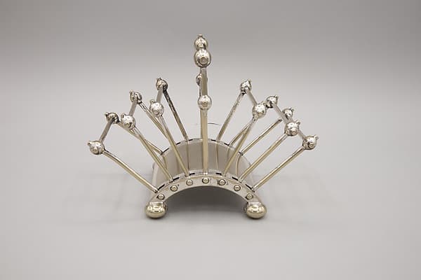 Toast or letter rack, by Christopher Dresser