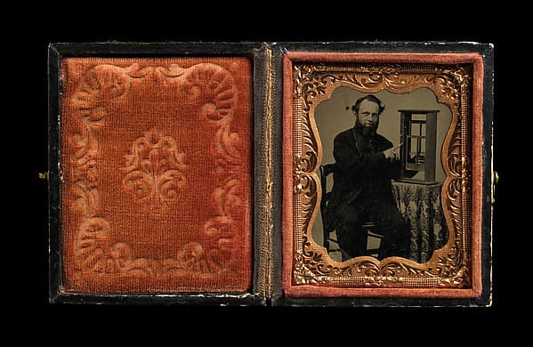 [Man Demonstrating Patent Model for Sash Window], by Unknown