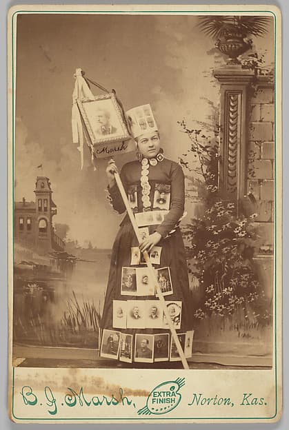 [Merchants' Carnival Portrait: B.J. Marsh Photography Studio, Norton, Kansas], by B. J. Marsh