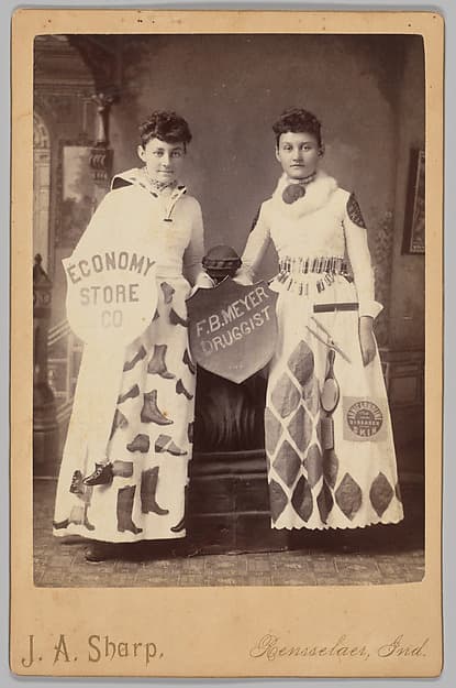 [Merchants' Carnival Portrait: Economy Store Co. and F.B. Meyer Druggist, Rensselaer, Indiana], by Joseph A. Sharp