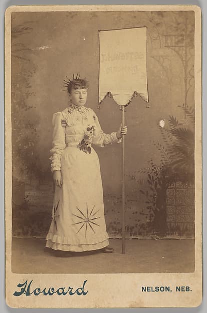 [Merchants' Carnival Portrait: J. Minette, Nelson, Nebraska], by Howard