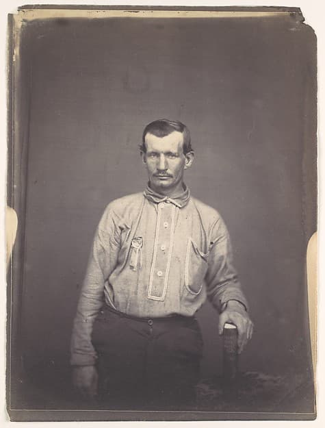 [Man Holding Patent Office Book], by Oliver H. Willard