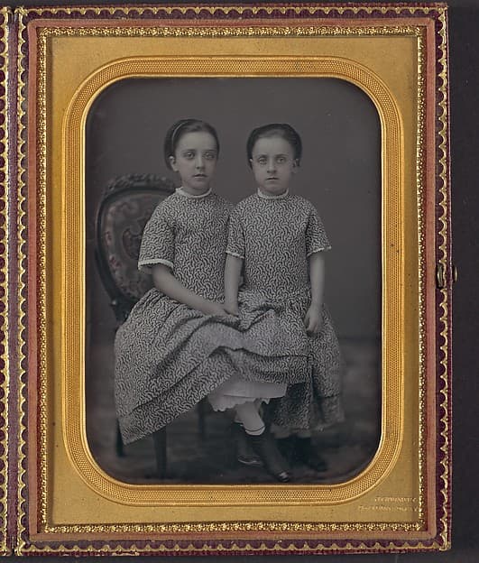[Two Girls in Identical Dresses], by Jeremiah Gurney