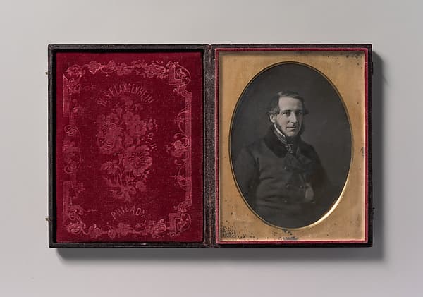 [Middle-aged Man with Chinstrap Beard, Hand Tucked Inside Buttoned Jacket], by W. & F. Langenheim