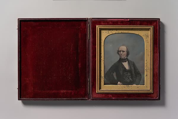 [Middle-aged Man with Glasses Holding Pocket Watch], by Antoine-François-Jean Claudet