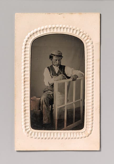 [Young Man Painting Window Sash], by Unknown