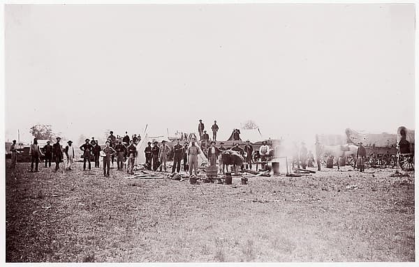 [Unidentified Company of Soldiers and Civilians (?) in Field], by Unknown