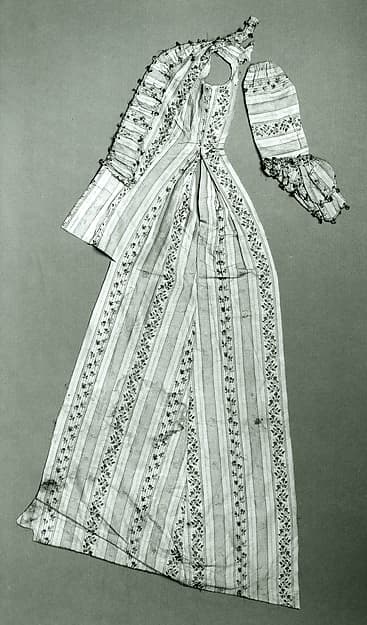 Part of a dress and twenty-five fragments