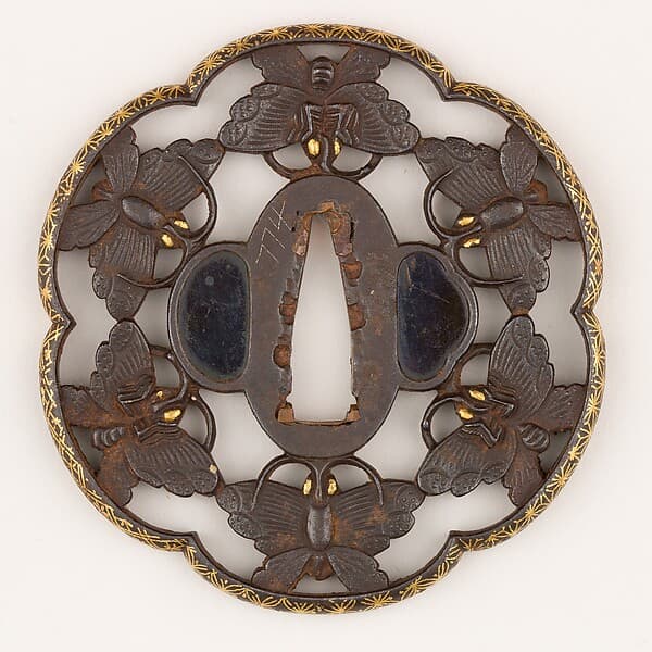 Sword Guard (Tsuba) Depicting Six Connected Butterflies (六つ蝶繋透鐔)