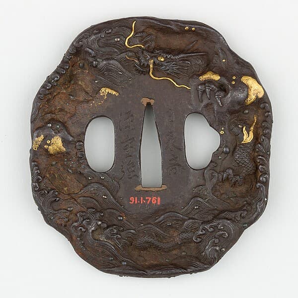 Sword Guard (Tsuba) Depicting Dragon in Waves (波に龍図鐔)