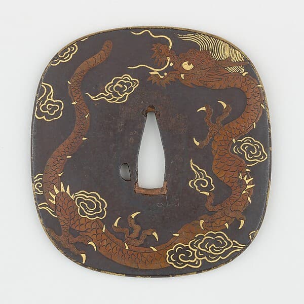 Sword Guard (Tsuba) Depicting Dragon and Paulownia Leaves With Tendrils (龍と桐唐草図鐔)