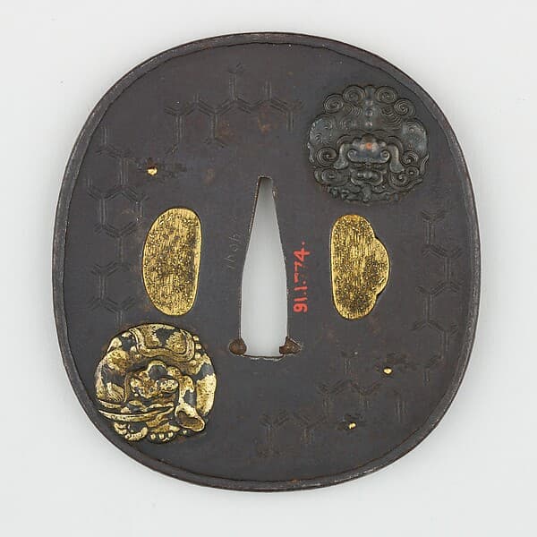 Sword Guard (Tsuba) Depicting Shishi Lion and Elephant (獅子象図鐔)