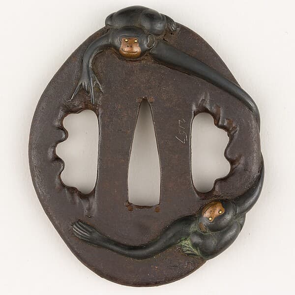Sword Guard (Tsuba) Depicting Two Gibbons (二疋手長猿図鐔)