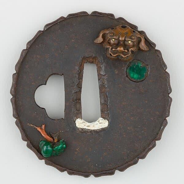 Sword Guard (Tsuba) Depicting an Arrangement of Masks (面散図鐔)