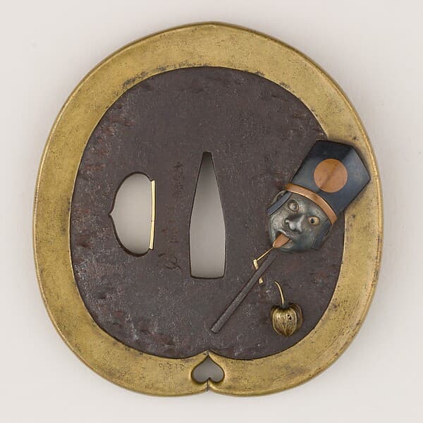 Sword guard (Tsuba) Depicting Head on Stick Toy (首人形図鐔)