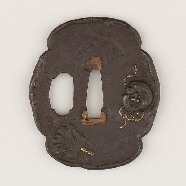 Sword guard (Tsuba) Depicting Comical Character Hyottoko (火男図鐔)
