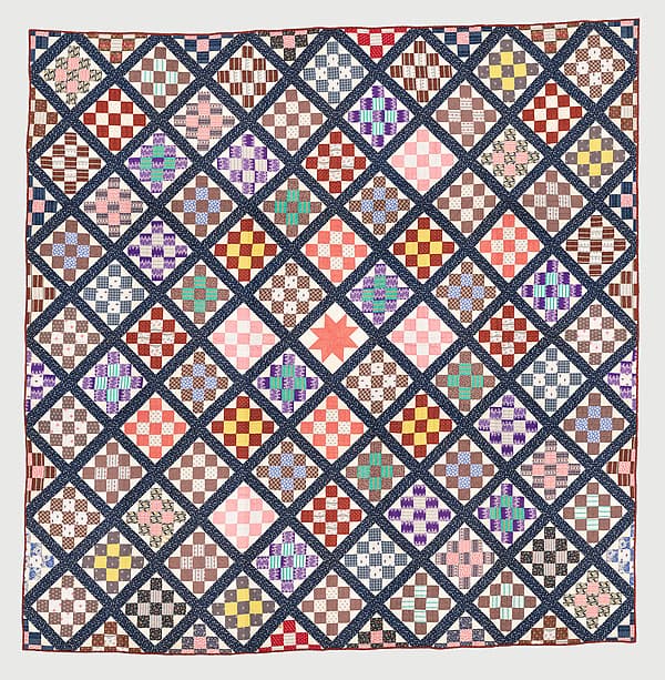 Thirteen-patch block quilt with Japanesque backing fabric, by Unknown